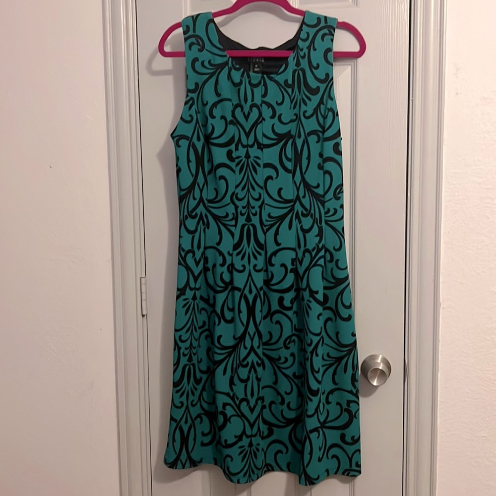 Emerald green and navy patterned EnFocus Studio dress.